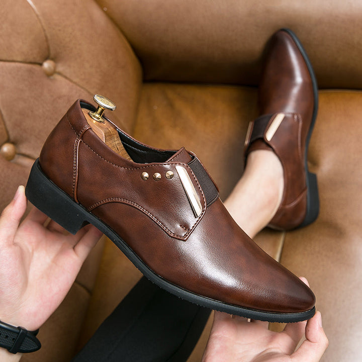 Patent leather slip-on loafers with gold accents