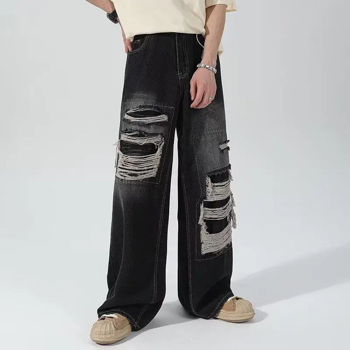Wide-leg distressed denim jeans