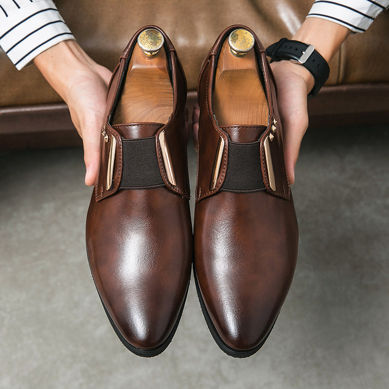 Patent leather slip-on loafers with gold accents