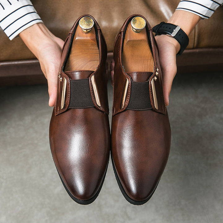 Patent leather slip-on loafers with gold accents