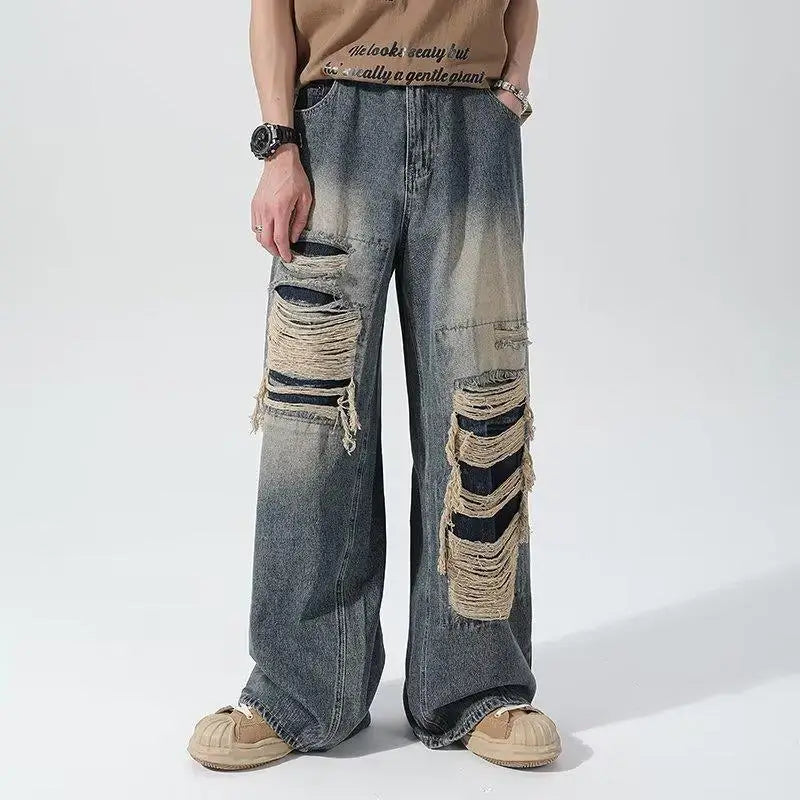 Wide-leg distressed denim jeans