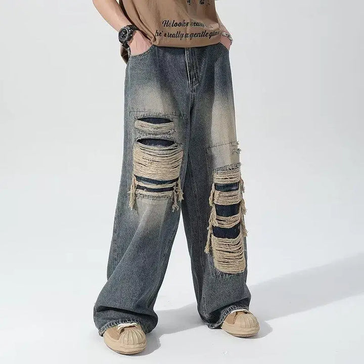 Wide-leg distressed denim jeans