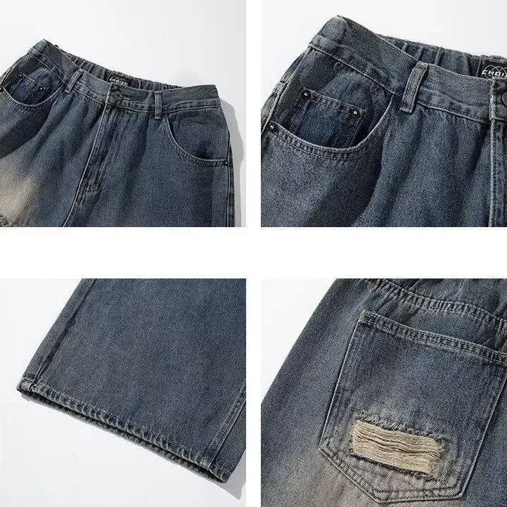 Wide-leg distressed denim jeans